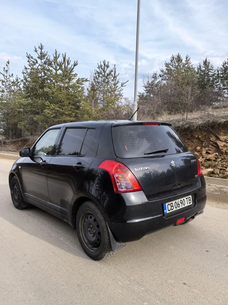 Suzuki Swift 1.3 4х4, снимка 6 - Автомобили и джипове - 48999136