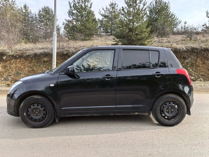 Suzuki Swift 1.3 4х4, снимка 7 - Автомобили и джипове - 48999136