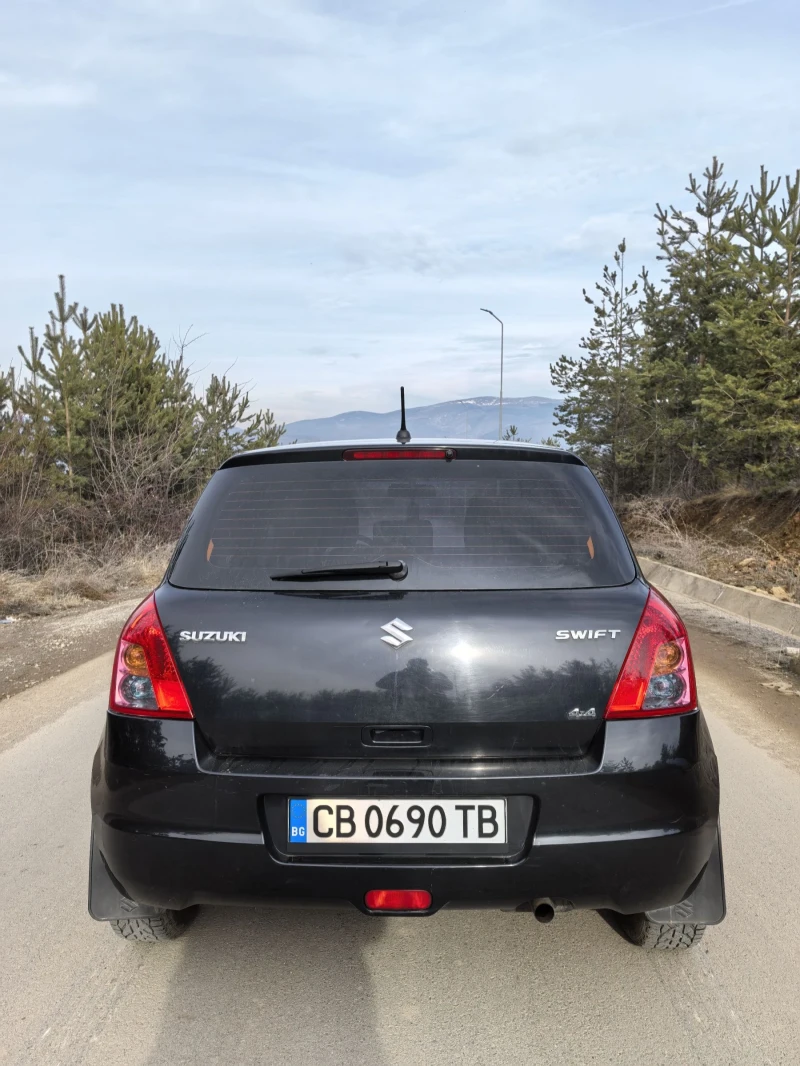 Suzuki Swift 1.3 4х4, снимка 4 - Автомобили и джипове - 48999136