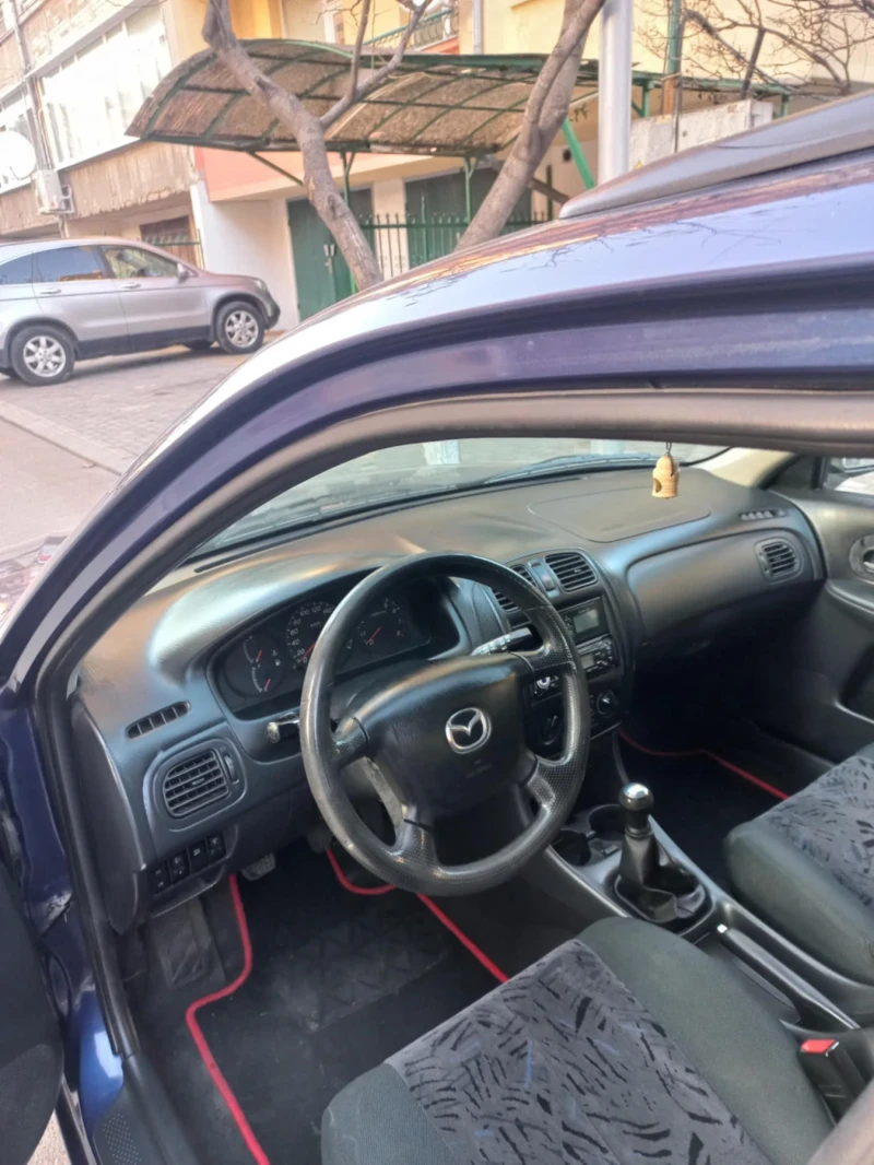 Mazda 323 1.5I, снимка 11 - Автомобили и джипове - 48910613