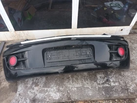 задна броня Санг Йонг Актион екшън 2.0д черен