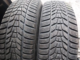 Гуми Зимни 215/65R17, снимка 1 - Гуми и джанти - 44892672