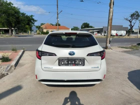 Toyota Corolla 1.8i-Sports Touring-Hybrid-Kamera-Euro6D-100.000km - 33300 лв. - 76766439 6