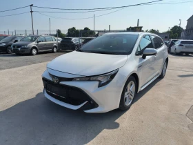Toyota Corolla 1.8i-Sports Touring-Hybrid-Kamera-Euro6D-100.000km - 33300 лв. - 76766439 3