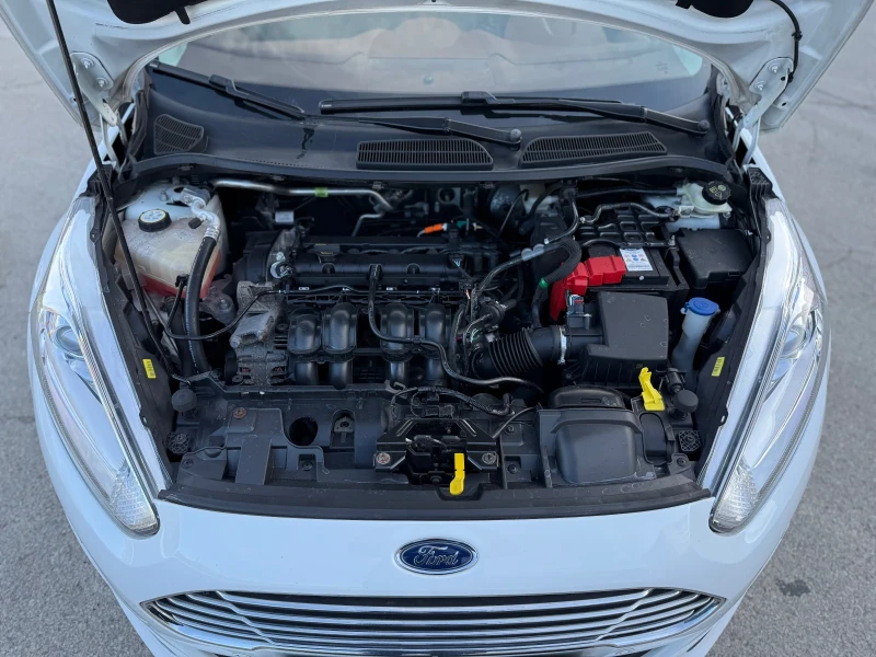 Ford Fiesta 1.6i AUTOMATIC, снимка 14 - Автомобили и джипове - 52250352