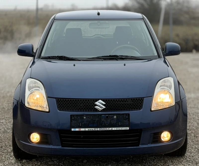 Suzuki Swift 1.3i 90к.с * Климатик* , снимка 2 - Автомобили и джипове - 53459269