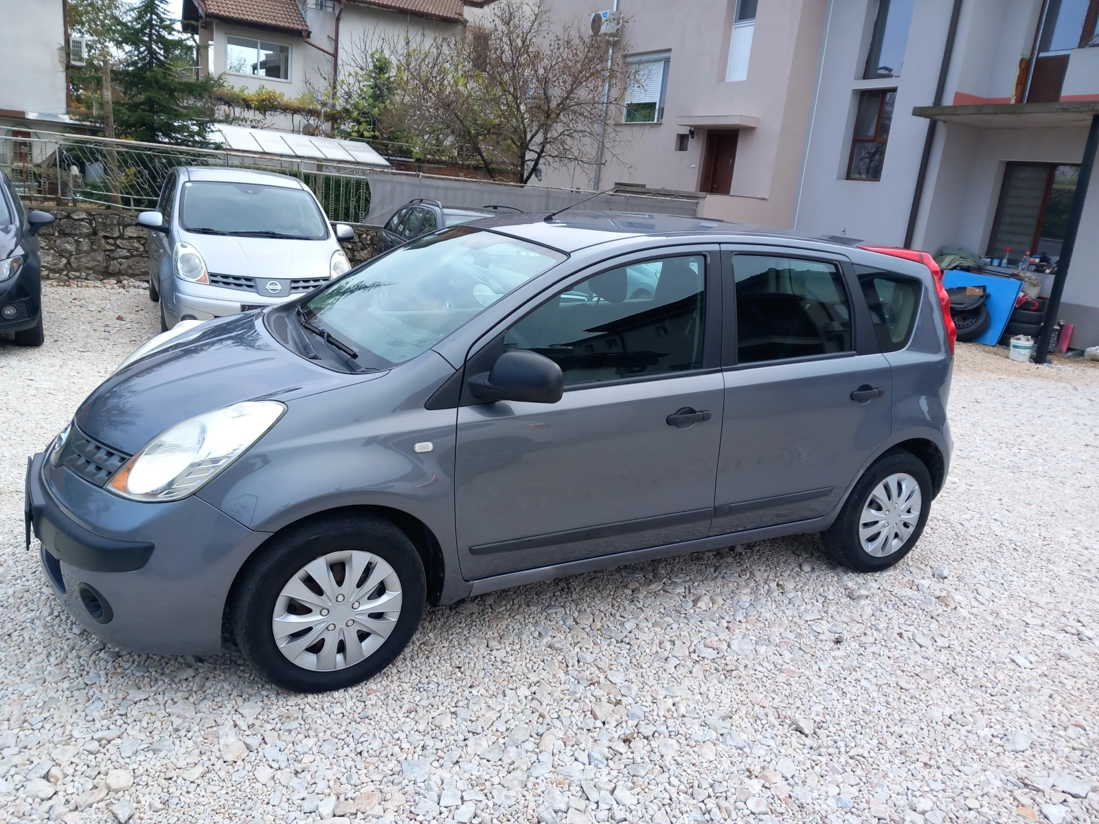Nissan Note 1.4i клима 88кс - изображение 6