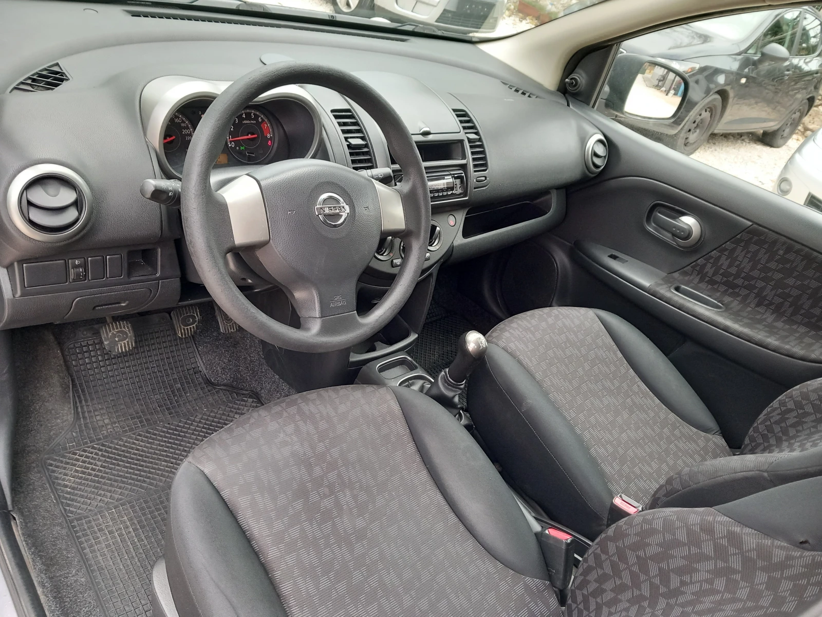 Nissan Note 1.4i клима 88кс - изображение 10