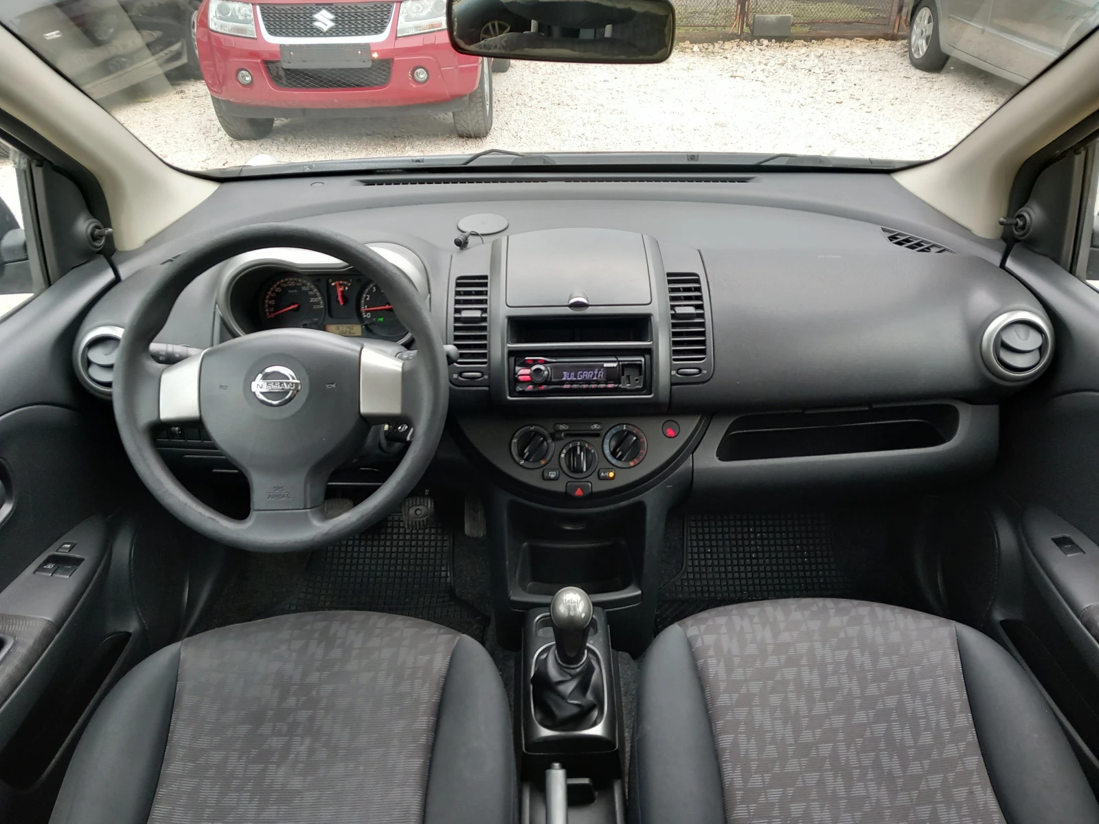 Nissan Note 1.4i клима 88кс - изображение 9