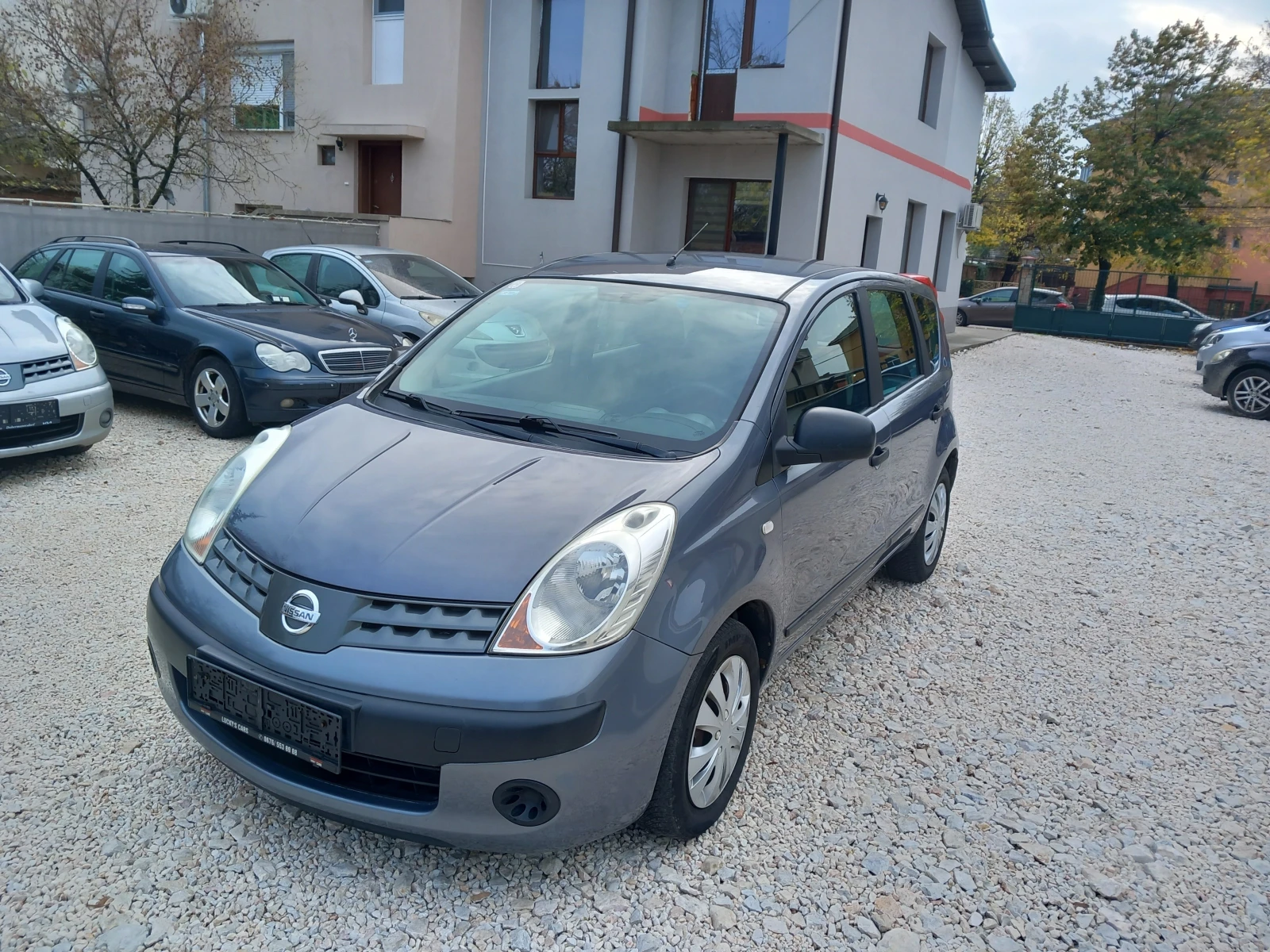 Nissan Note 1.4i клима 88кс - изображение 7