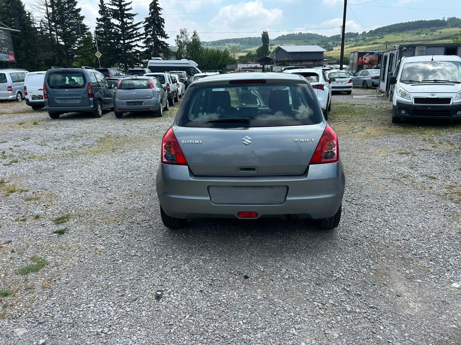 Suzuki Swift 1.3i LPG, снимка 6 - Автомобили и джипове - 55171276