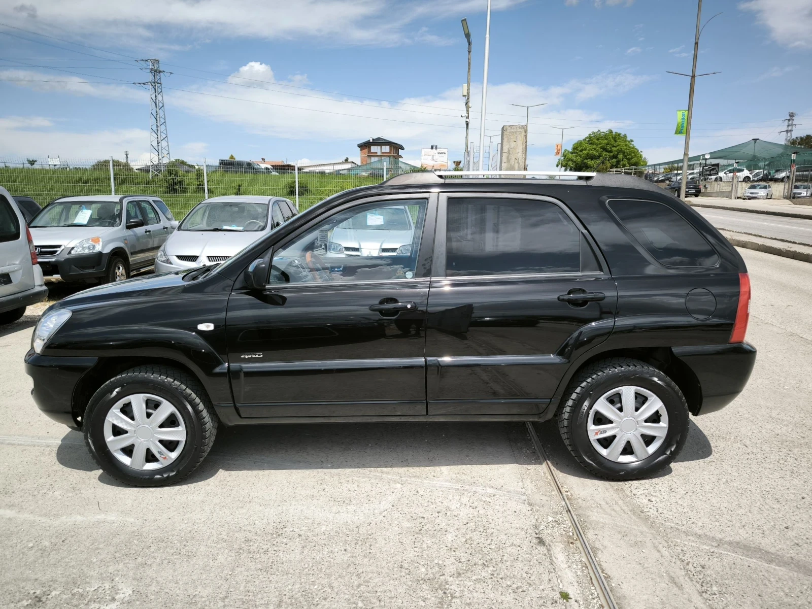 Kia Sportage 2.0D 4x4, снимка 6 - Автомобили и джипове - 54519363