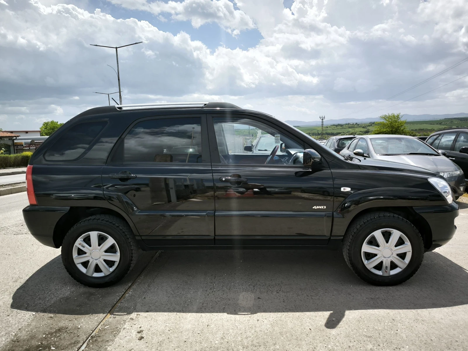 Kia Sportage 2.0D 4x4, снимка 4 - Автомобили и джипове - 54519363