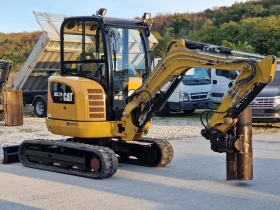 Багер Caterpillar 302.7D CR/3.0т/Powertilt/Хидр.Откл./НулевРадиус/, снимка 2