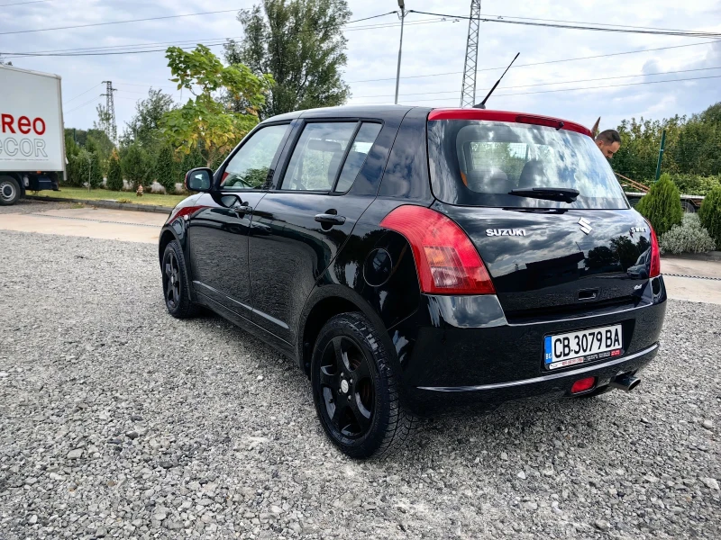 Suzuki Swift 1.3 4x4, снимка 6 - Автомобили и джипове - 47063523