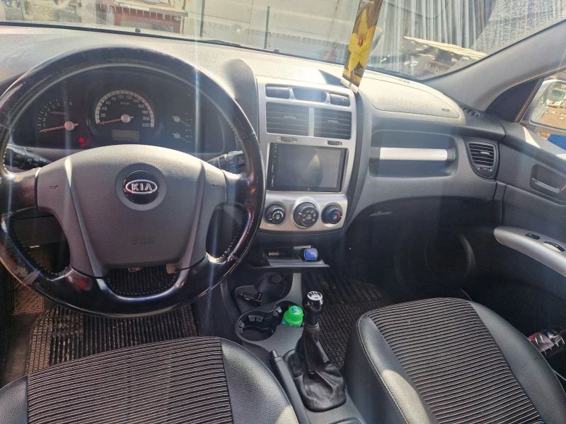 Kia Sportage, снимка 15 - Автомобили и джипове - 47670933