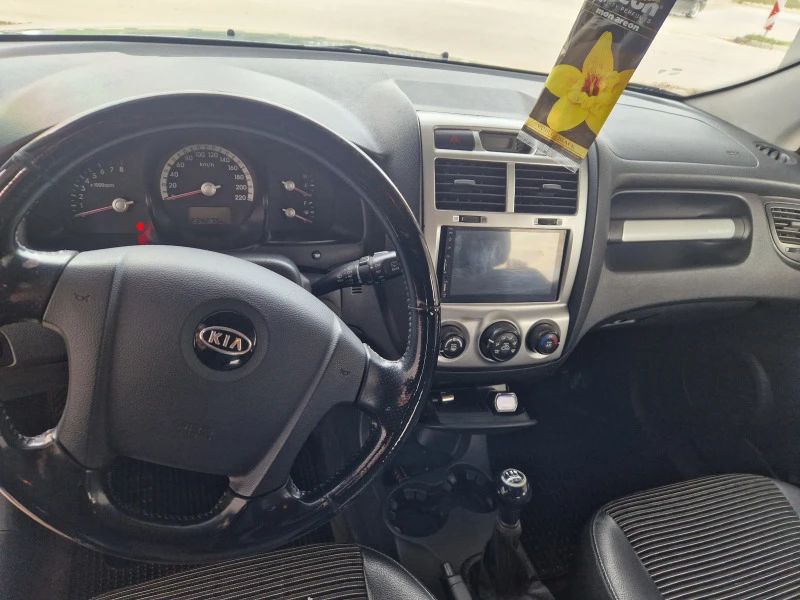 Kia Sportage, снимка 7 - Автомобили и джипове - 47670933