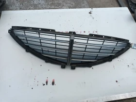 решетка между фаровете Санг Йонг Актион 2,3бензин
