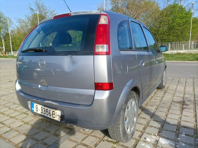 Opel Meriva, снимка 8 - Автомобили и джипове - 45304088