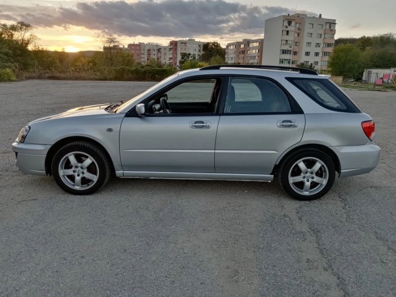 Subaru Impreza 2.0 i 4X4 klima, снимка 5 - Автомобили и джипове - 47539431