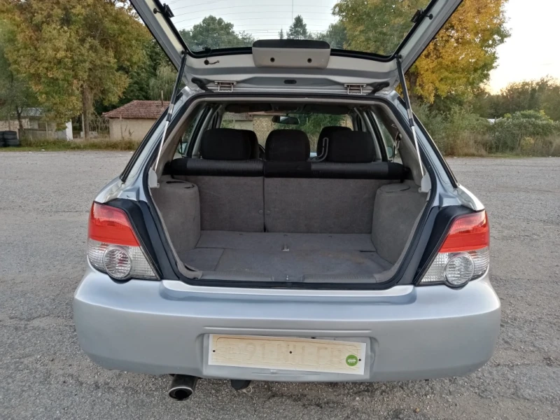 Subaru Impreza 2.0 i 4X4 klima, снимка 16 - Автомобили и джипове - 47539431