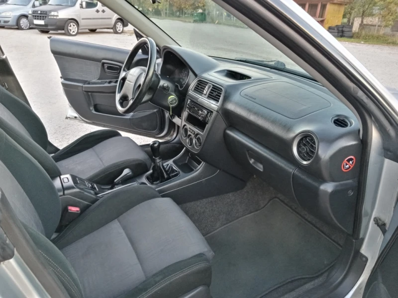 Subaru Impreza 2.0 i 4X4 klima, снимка 11 - Автомобили и джипове - 47539431