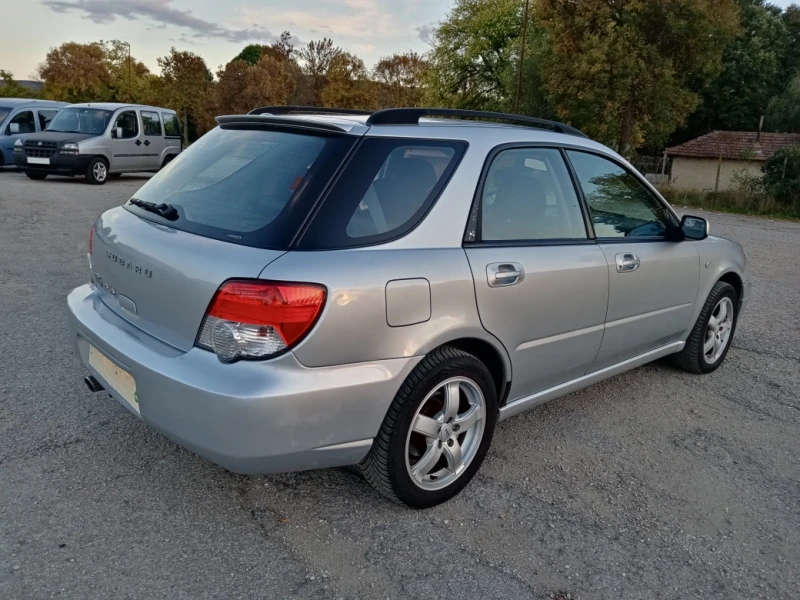 Subaru Impreza 2.0 i 4X4 klima, снимка 6 - Автомобили и джипове - 47539431