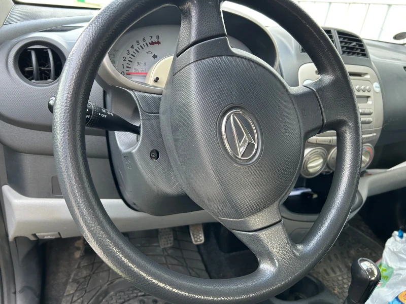 Daihatsu Sirion, снимка 14 - Автомобили и джипове - 53011128