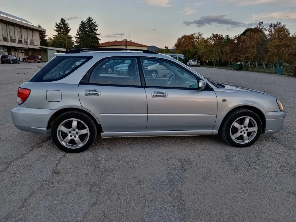 Subaru Impreza 2.0 i 4X4 klima - изображение 7