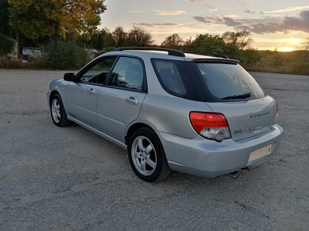 Subaru Impreza 2.0 i 4X4 klima - изображение 4