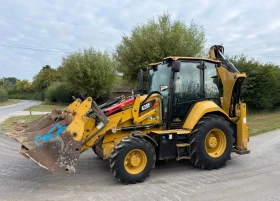 Багер Caterpillar 428F2
