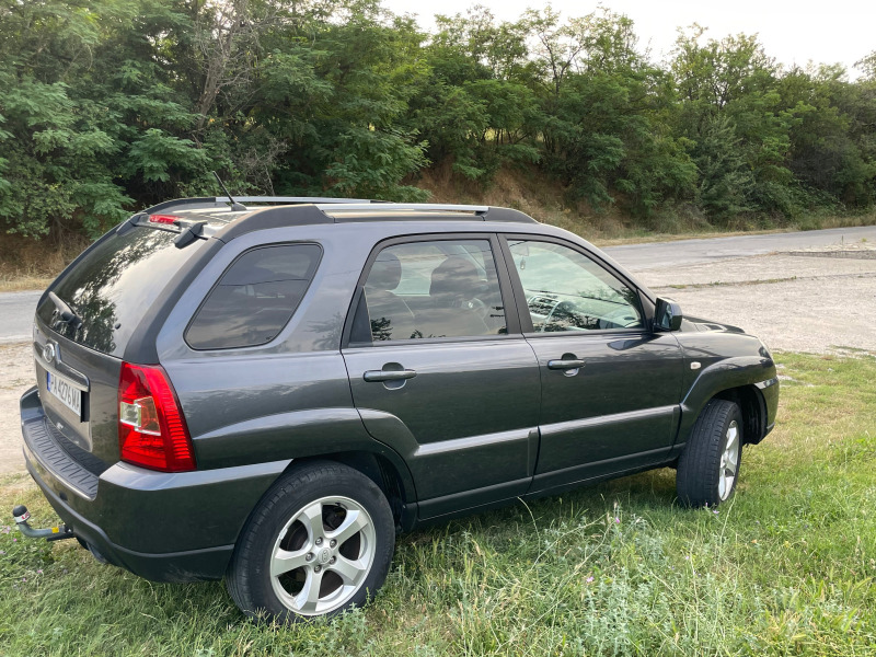 Kia Sportage 2.0 CRDI, снимка 4 - Автомобили и джипове - 46599730