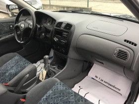 Mazda 323 1.5i 16V 90ks, снимка 11 - Автомобили и джипове - 43378328