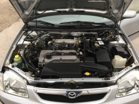 Mazda 323 1.5i 16V 90ks, снимка 16 - Автомобили и джипове - 43378328