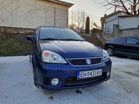 Suzuki Liana 1.6 4x4 ГАЗ.ИНЖ - изображение 1