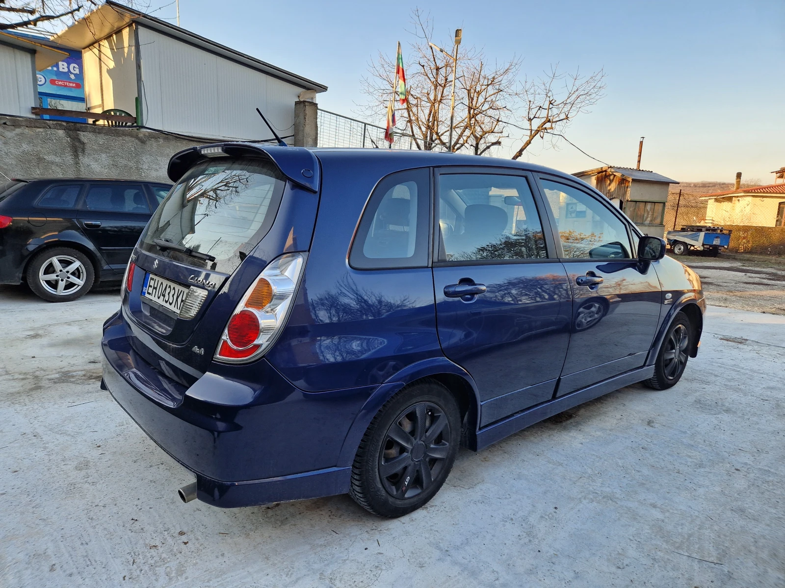 Suzuki Liana 1.6 4x4 ГАЗ.ИНЖ - изображение 5