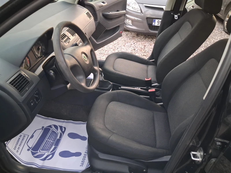 Skoda Fabia 1.4i* * КЛИМА* * КОМБИ, снимка 8 - Автомобили и джипове - 52868780