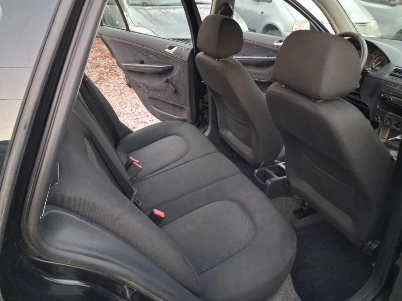 Skoda Fabia 1.4i* * КЛИМА* * КОМБИ, снимка 10 - Автомобили и джипове - 52868780