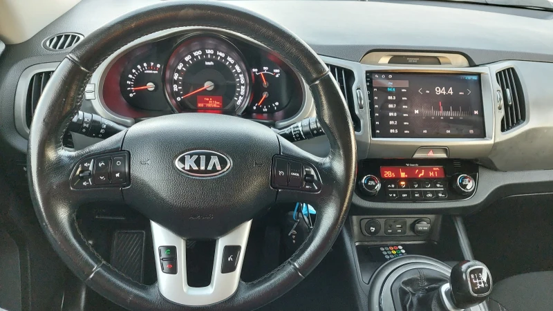 Kia Sportage 1.6i ГАЗ НАВИ КАМЕРА КСЕНОН, снимка 12 - Автомобили и джипове - 48853239