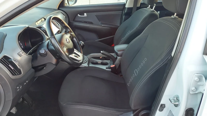 Kia Sportage 1.6i ГАЗ НАВИ КАМЕРА КСЕНОН, снимка 9 - Автомобили и джипове - 48853239