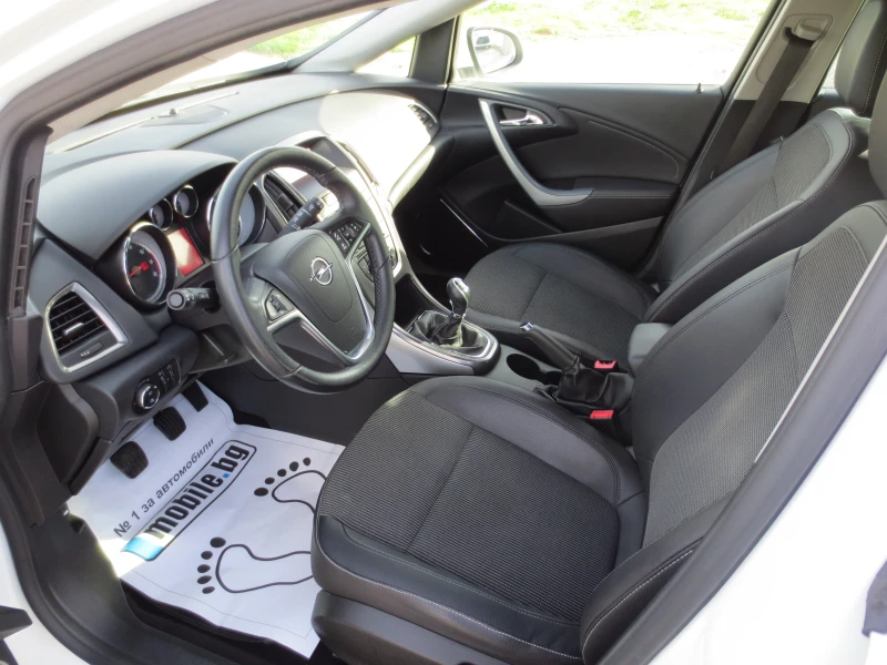 Opel Astra 1.4 i* TURBO* , снимка 9 - Автомобили и джипове - 52401044