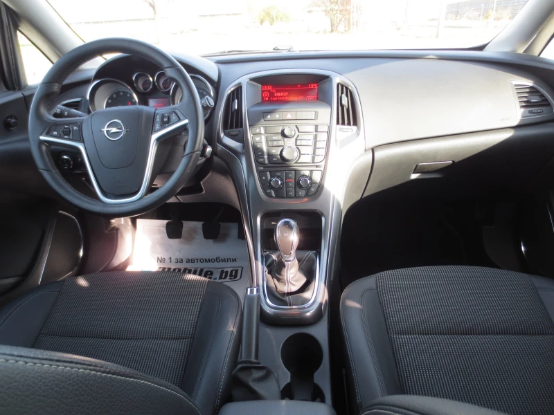 Opel Astra 1.4 i* TURBO* , снимка 13 - Автомобили и джипове - 52401044