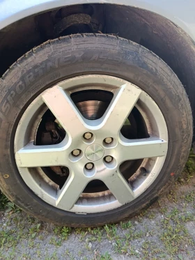Volvo V50 1.6 drive 115к.с + Нови зимни и летни гуми, снимка 11