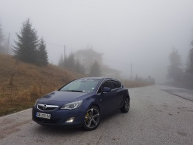 Opel Astra J Sport Tourer, снимка 7 - Автомобили и джипове - 45498377