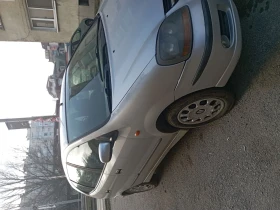 Nissan Almera tino Газ Бензин, снимка 2