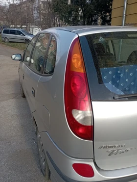 Nissan Almera tino Газ Бензин, снимка 7