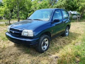 Suzuki Grand vitara 2.0бензин с климатик143хил км., снимка 1