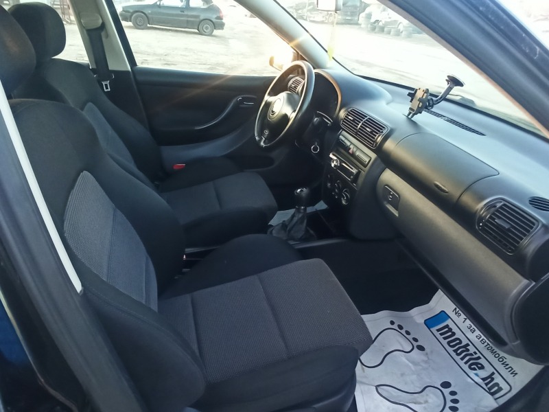 Seat Leon 1.6 б-н  газ, снимка 9 - Автомобили и джипове - 43710835