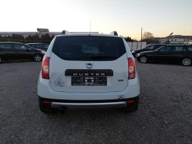 Dacia Duster 1.6i 90 652км., снимка 7