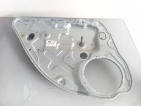 Машинка стъкло стъклоповдигач задна лява ръчна Форд Фокус комби (н)